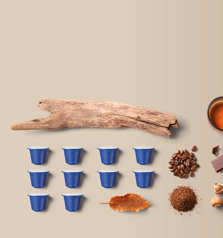 Bio-based and biodegradable capsules, free of fossil-based plastic. Designed to disappear under home composting conditions within 26 weeks, leaving only H₂O, CO₂ and humus behind. The coffee capsule is Nespresso® machine compatible